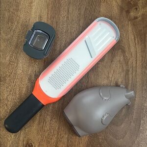 Joseph Joseph 2 in 1 mini grater and slicer and a sweet bear form grater